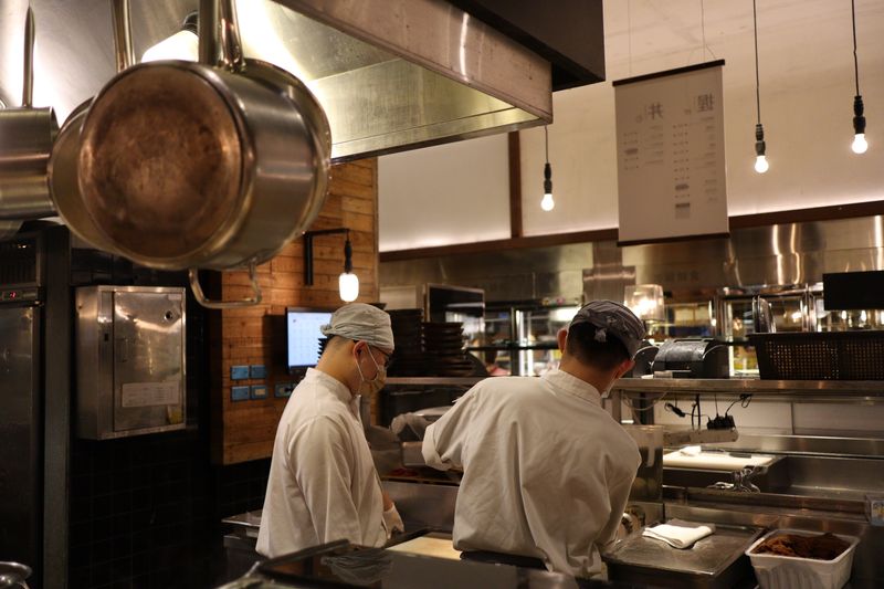 Primo hoagies team working together in our Charlotte kitchen